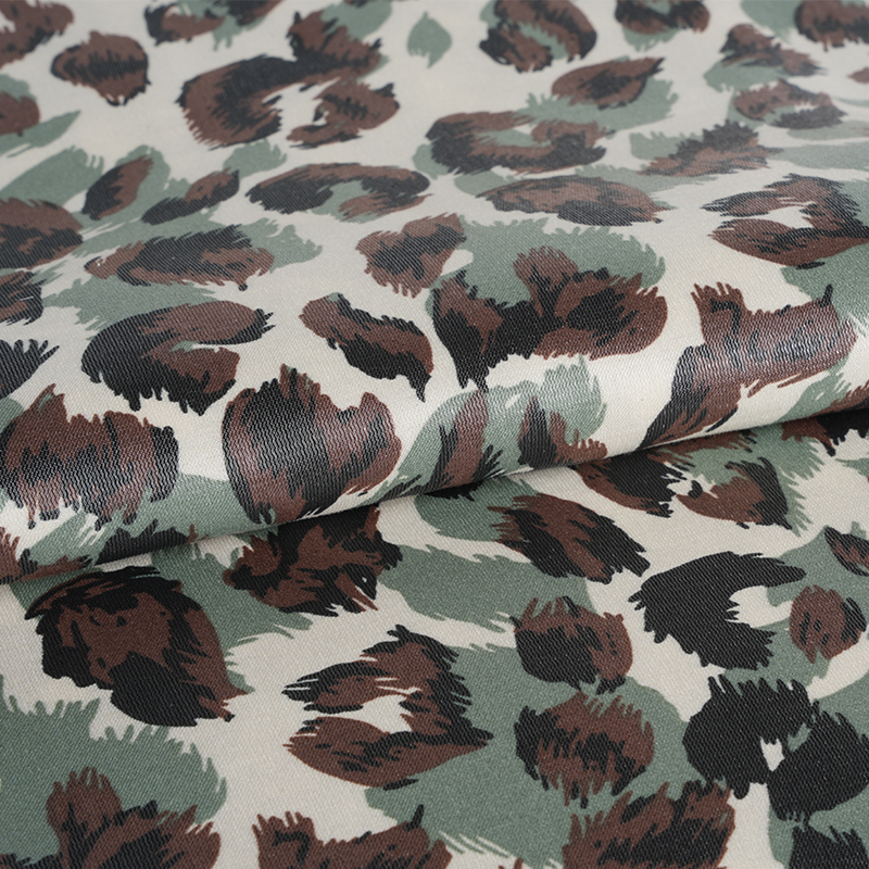 20D*21S vastagított arany pamut háromszínű leopárd nyomószövet